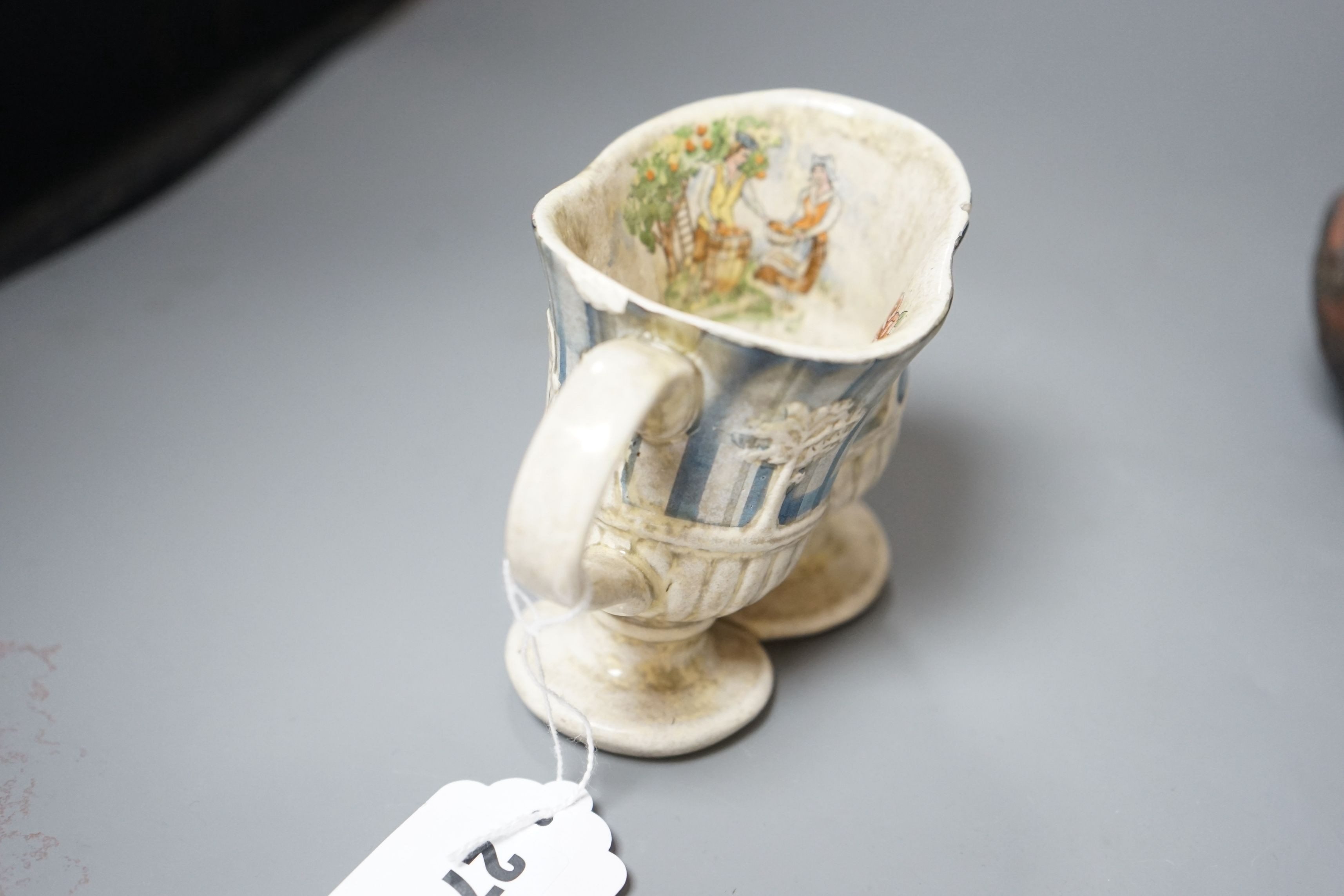 Carol McNicoll (b.1943), ‘Many a slip’ cup and another cup, with purchase receipt from Marsden Woo Gallery, 3 September 2015, tallest 10cm, (2)